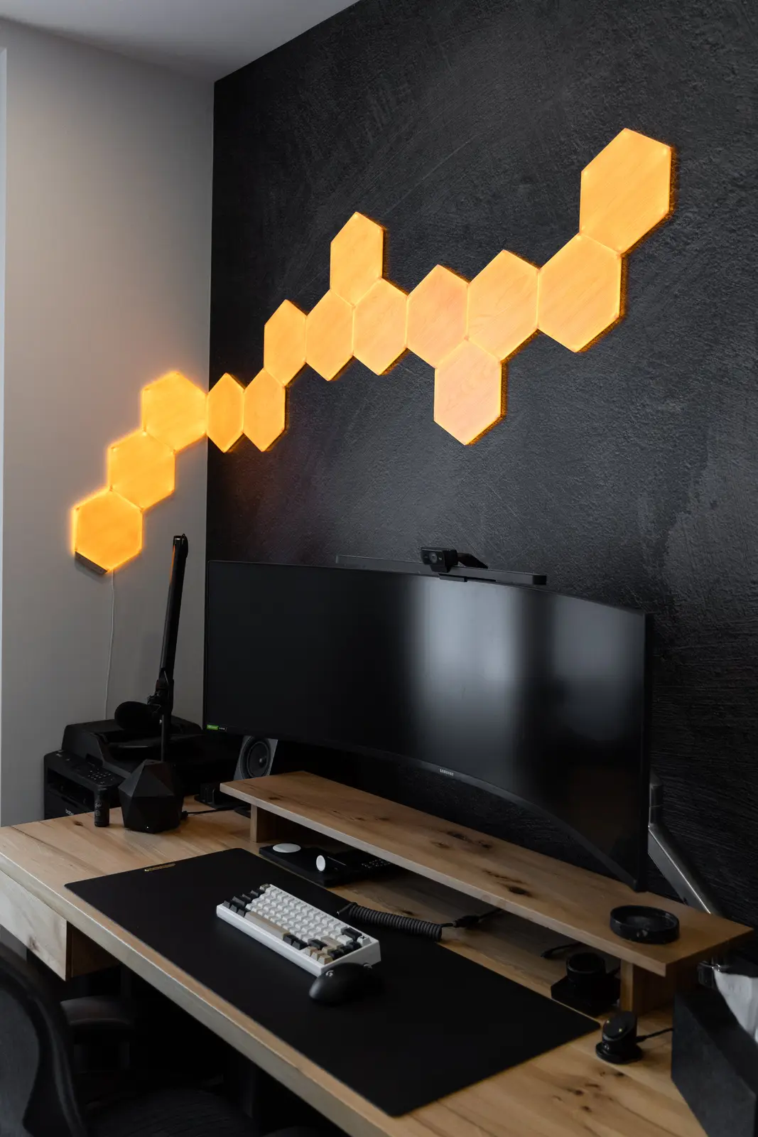 Hexagonal lights above the wood office desk in a Richmond Hill townhouse