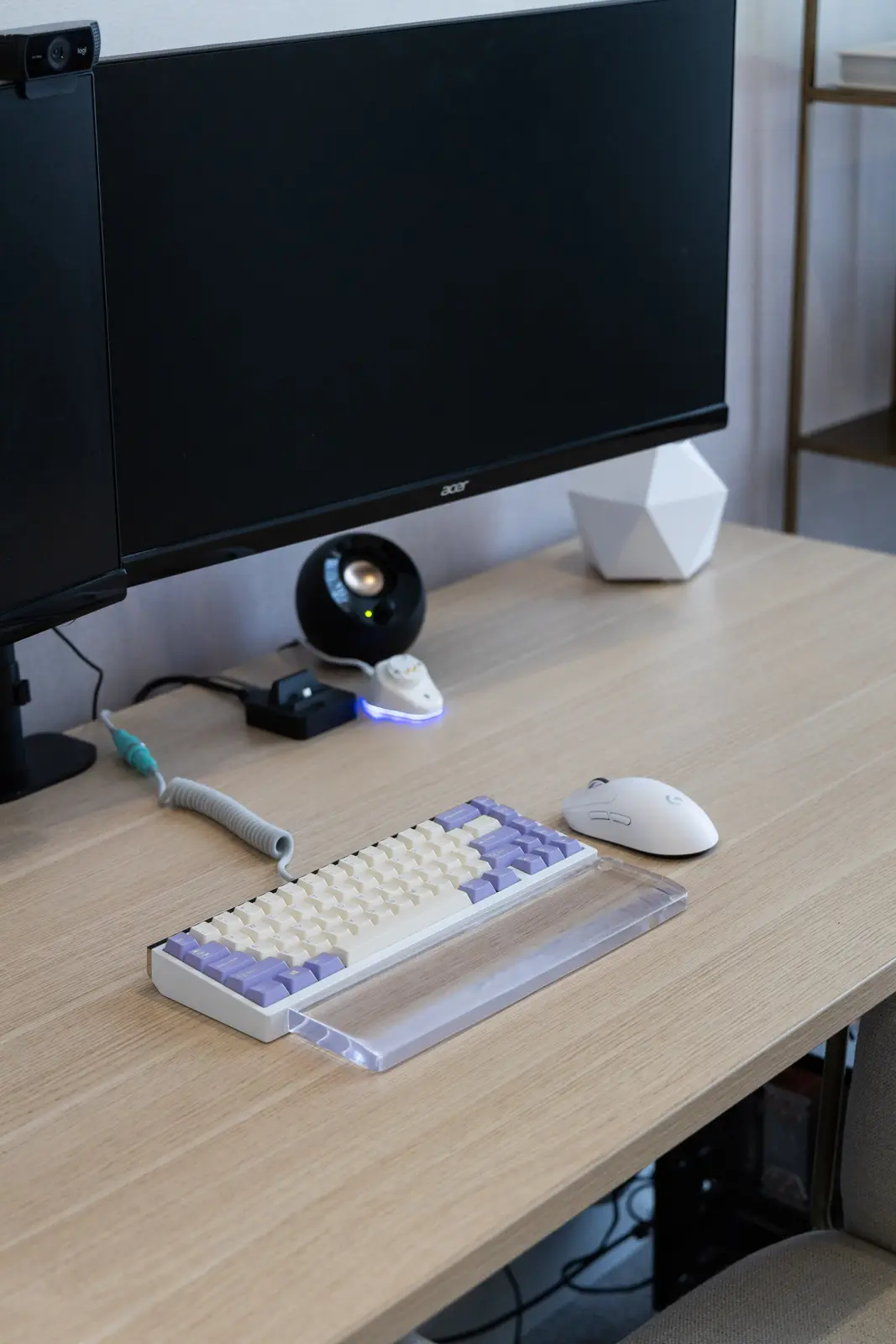 Office desk in a Richmond Hill townhouse, with a monitor and a keyboard