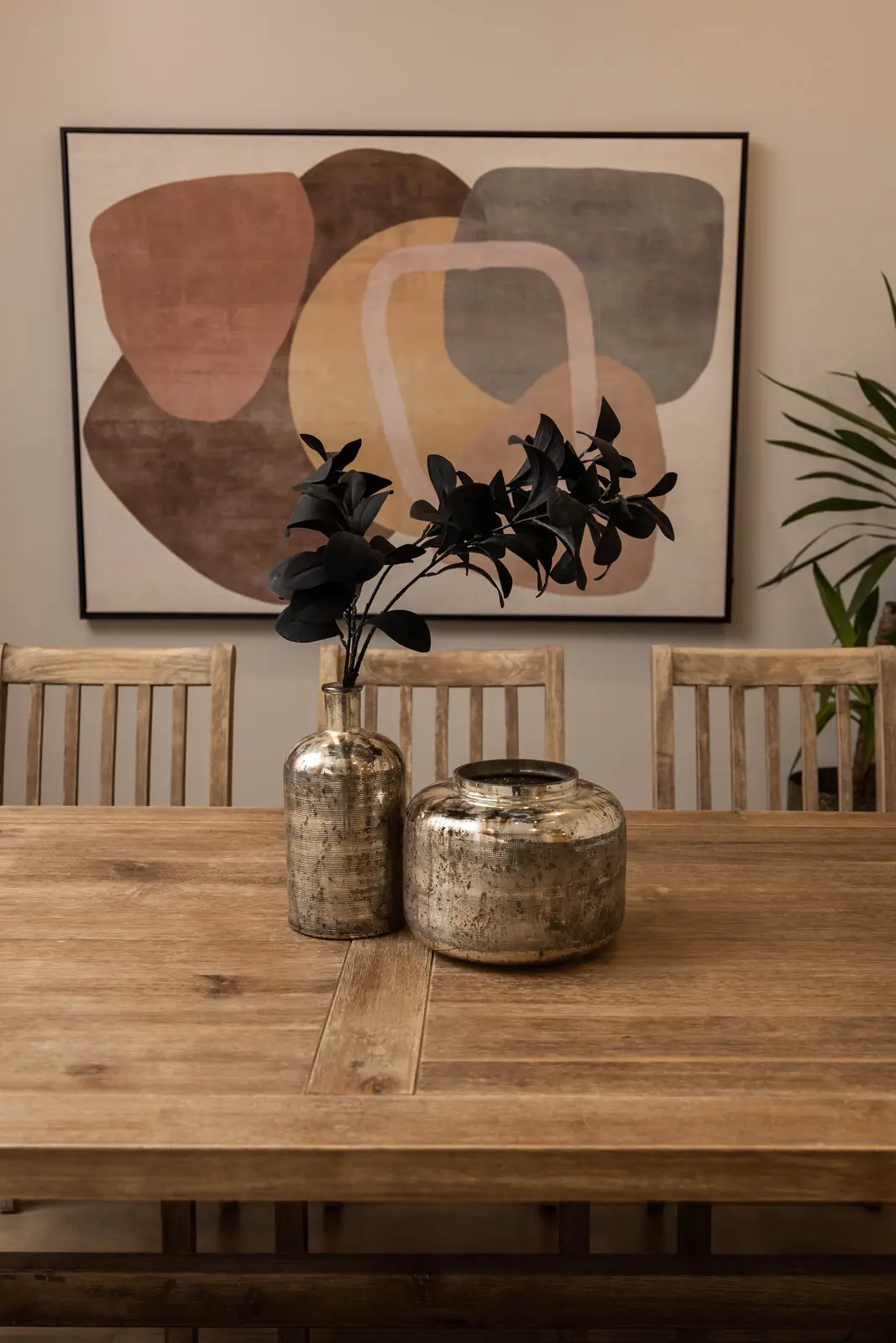 Interior of the Bristlewood Crescent renovation in Vaughan, with white cabinetry, warm wood floors, and black fittings.