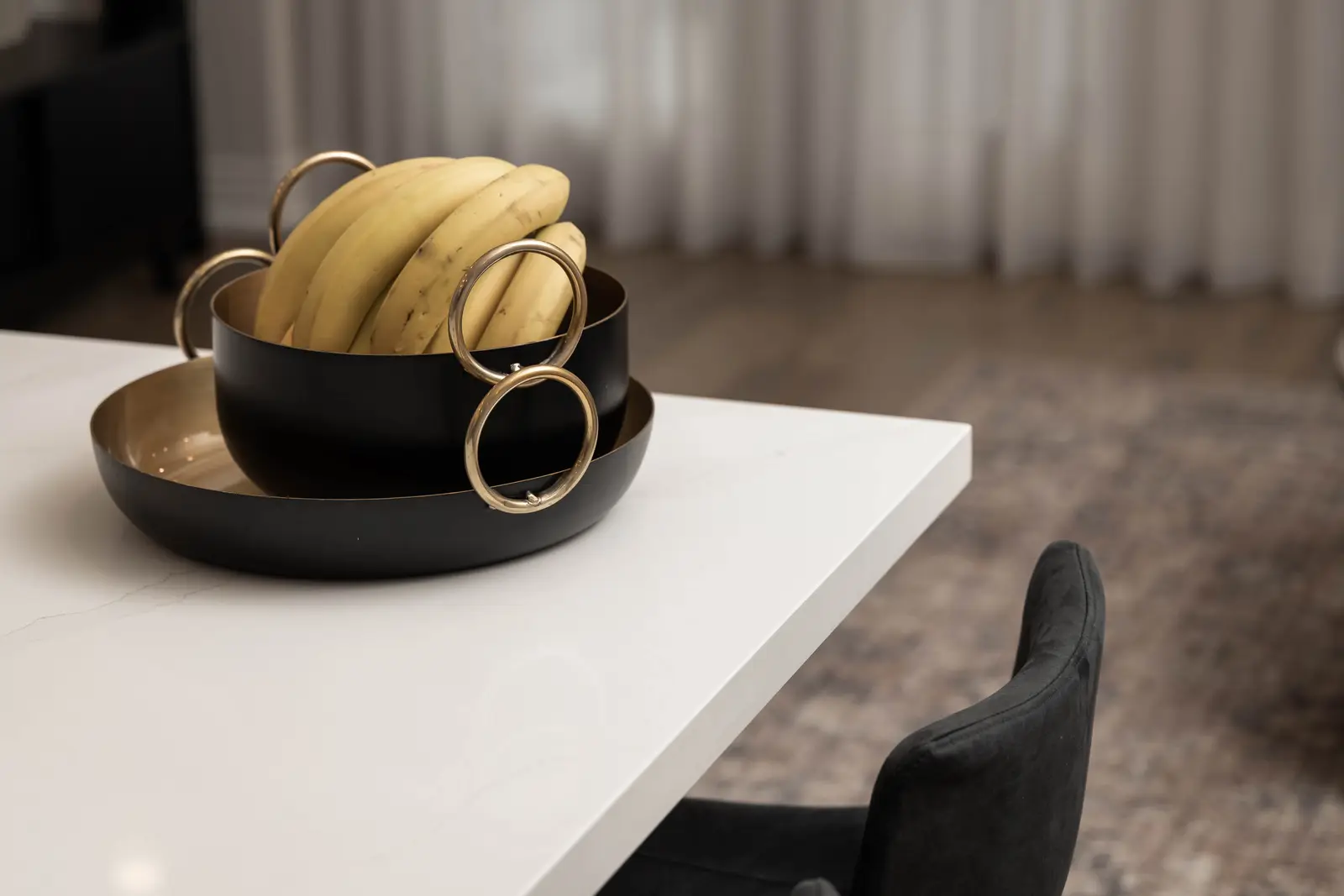 Interior of the Bristlewood Crescent renovation in Vaughan, with white cabinetry, warm wood floors, and black fittings.