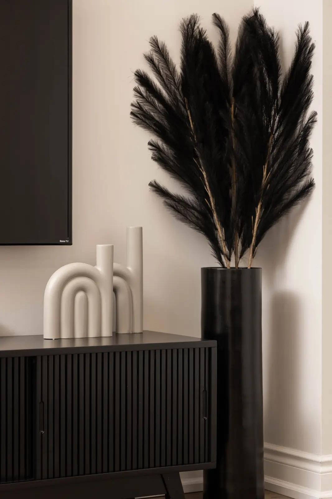 Interior of the Bristlewood Crescent renovation in Vaughan, with white cabinetry, warm wood floors, and black fittings.