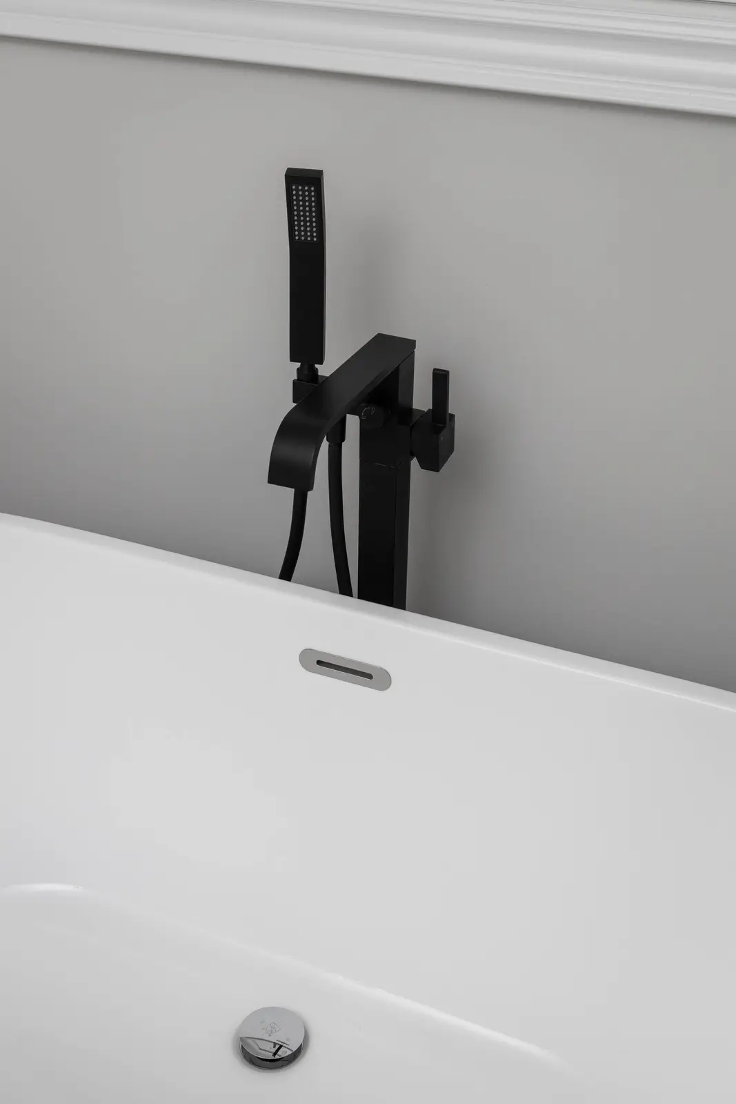 Interior of the Bristlewood Crescent renovation in Vaughan, with white cabinetry, warm wood floors, and black fittings.