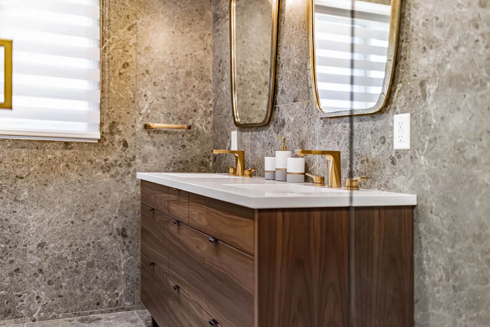 Interior of a Thornhill house renovation, with sage cabinetry, light wood floors, walnut, and brass fittings.