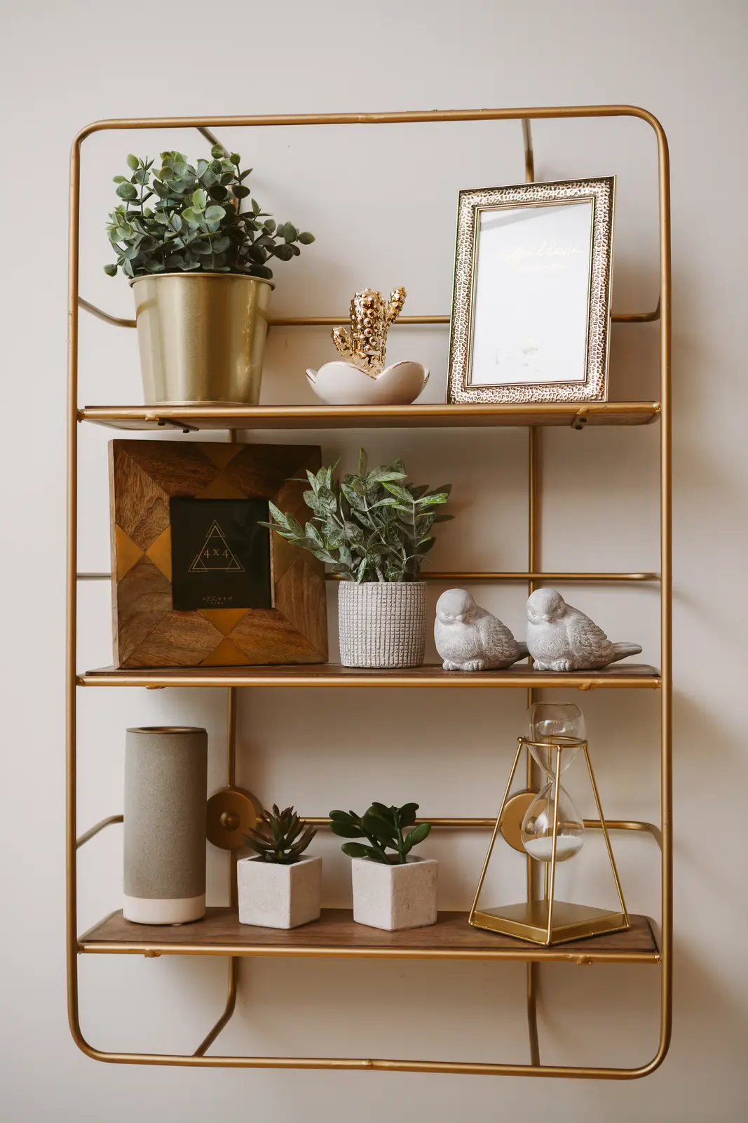 Interior of a downtown Toronto condo, with a wood kitchen, a grey sofa, and a balcony.